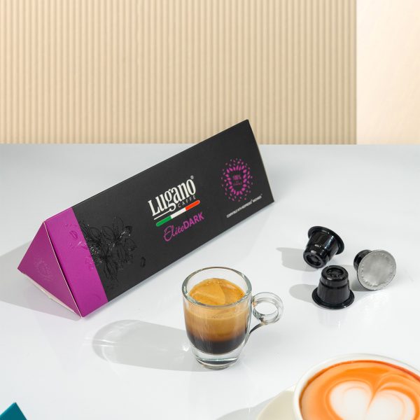 Lugano Caffè Elite Dark Espresso Capsule Triangular Pack 10 Pcs wih an espresso cup in a set